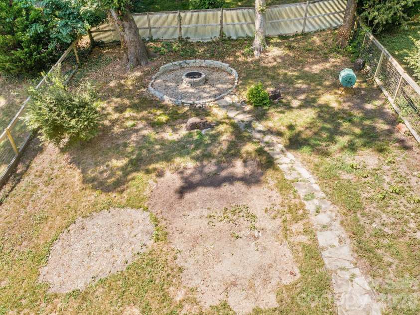 27 Hubbard Avenue, Asheville, NC 28806.  MLS# CAR4416659, YatesRealty ID 51187. Fully Fenced Backyard w/ Firepit