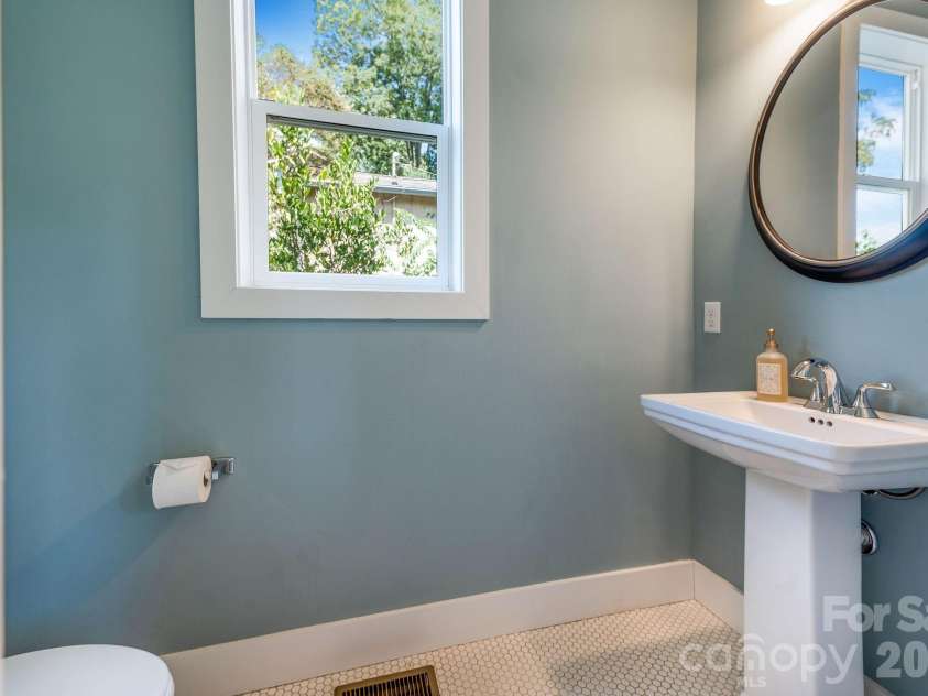 27 Hubbard Avenue, Asheville, NC 28806.  MLS# CAR4416659, YatesRealty ID 51187. Main Level / 1/2 bath