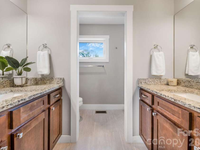 27 Hubbard Avenue, Asheville, NC 28806.  MLS# CAR4416659, YatesRealty ID 51187. Primary en suite bath/ second level
