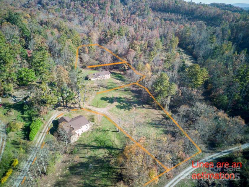 85,89 Old Farm Circle, Hendersonville, NC 28792.  MLS# CAR4195496, YatesRealty ID 5119. Aerial of the whole subdivision