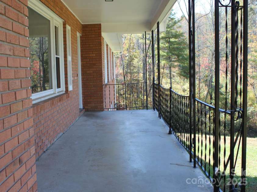 85,89 Old Farm Circle, Hendersonville, NC 28792.  MLS# CAR4195496, YatesRealty ID 5119. Covered front porch