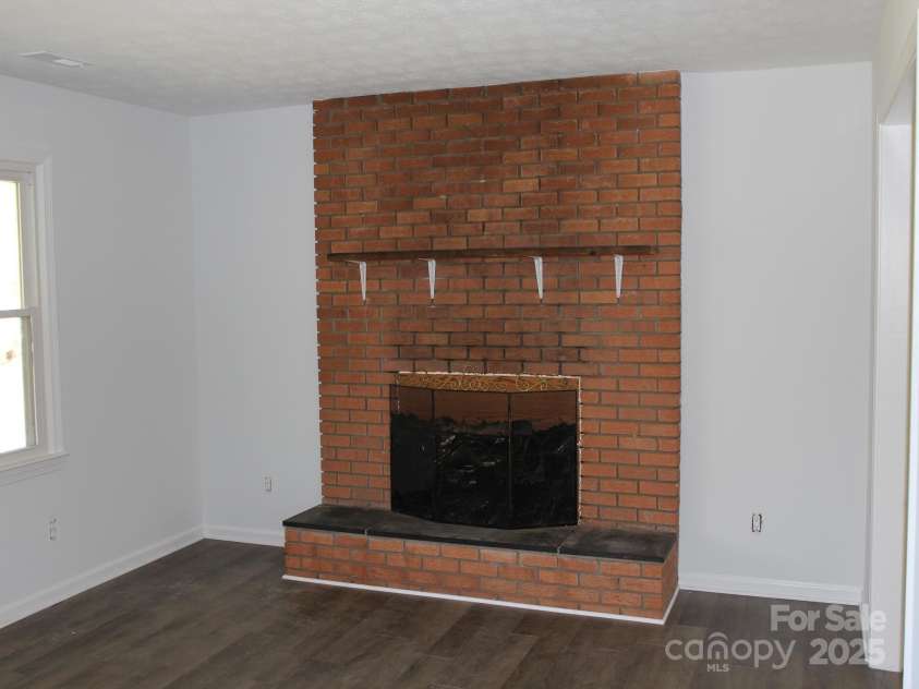 85,89 Old Farm Circle, Hendersonville, NC 28792.  MLS# CAR4195496, YatesRealty ID 5119. Fireplace