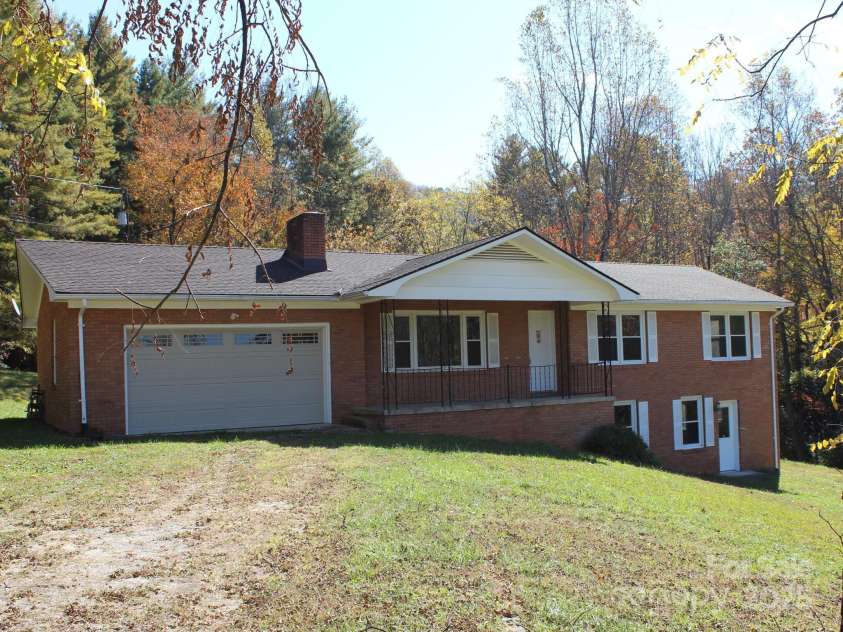 85,89 Old Farm Circle, Hendersonville, NC 28792.  MLS# CAR4195496, YatesRealty ID 5119. Front view