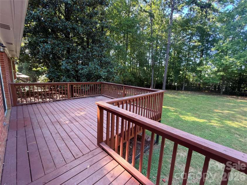 248 Hillcrest Avenue, Rock Hill, SC 29732.  MLS# CAR4425348, YatesRealty ID 51194. Spacious back deck extends from the rear hallway to the kitchen.