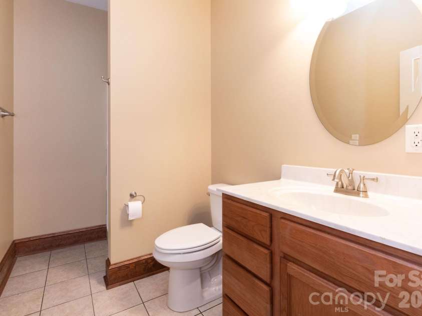 5 Meadowbrook Lane, Weaverville, NC 28787.  MLS# CAR4425213, YatesRealty ID 51199. Lower Level Bathroom