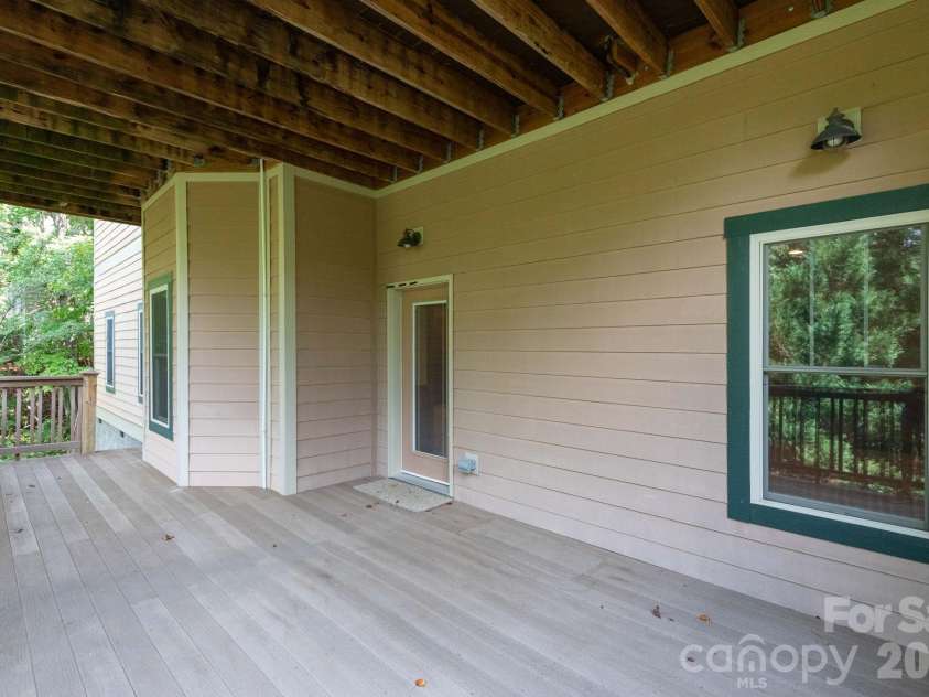 5 Meadowbrook Lane, Weaverville, NC 28787.  MLS# CAR4425213, YatesRealty ID 51199. Lower Level Deck