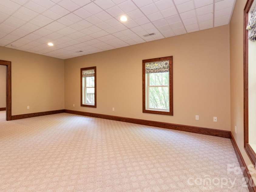 5 Meadowbrook Lane, Weaverville, NC 28787.  MLS# CAR4425213, YatesRealty ID 51199. Lower Level Game Room
