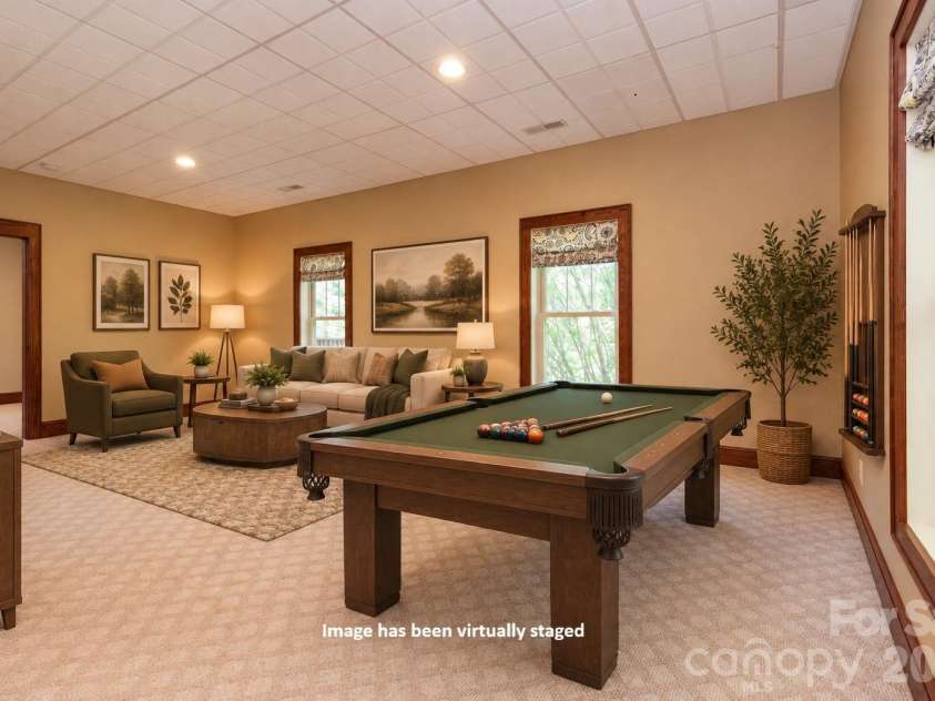 5 Meadowbrook Lane, Weaverville, NC 28787.  MLS# CAR4425213, YatesRealty ID 51199. Lower Level Game Room - Virtually Staged