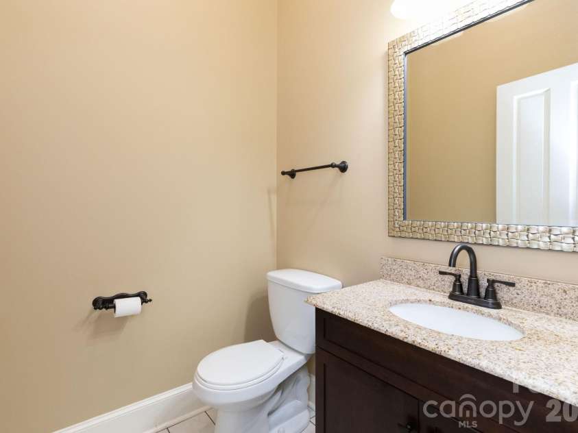 5 Meadowbrook Lane, Weaverville, NC 28787.  MLS# CAR4425213, YatesRealty ID 51199. Main Level Half Bath