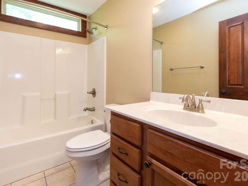 5 Meadowbrook Lane, Weaverville, NC 28787.  MLS# CAR4425213, YatesRealty ID 51199. Upper Level Bathroom