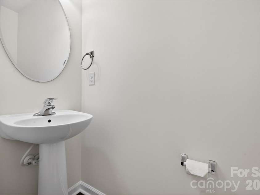 11515 Elizabeth Madison Court, Charlotte, NC 28277.  MLS# CAR4355465, YatesRealty ID 5120. Downstairs 1/2 bath