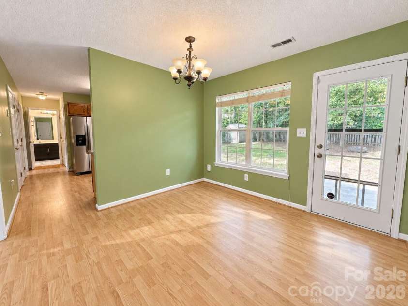 4075 Zebulon Avenue, Concord, NC 28027.  MLS# CAR4425234, YatesRealty ID 51208. Dining Room with large window and natural lighting
