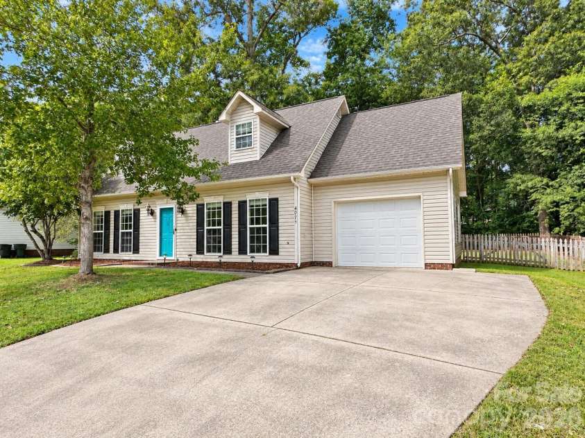 4075 Zebulon Avenue, Concord, NC 28027.  MLS# CAR4425234, YatesRealty ID 51208. Garage with long driveway
