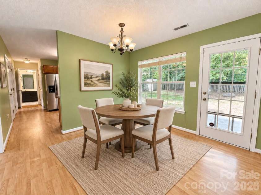 4075 Zebulon Avenue, Concord, NC 28027.  MLS# CAR4425234, YatesRealty ID 51208. Virtual staged dining room