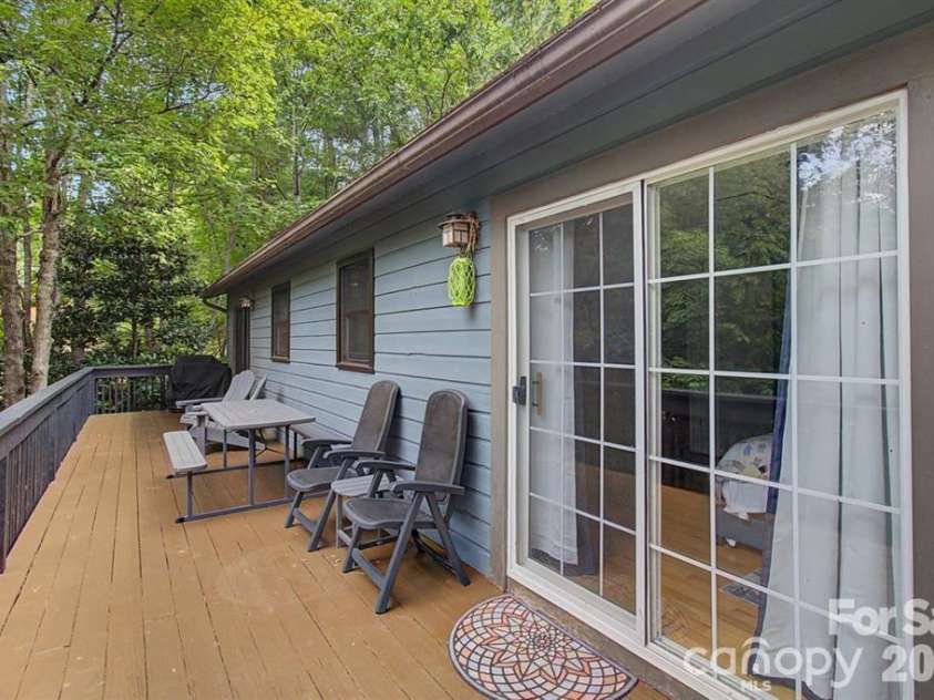 30 Whippoorwill Drive, Weaverville, NC 28787.  MLS# CAR4425568, YatesRealty ID 51211. Freshly stained back deck