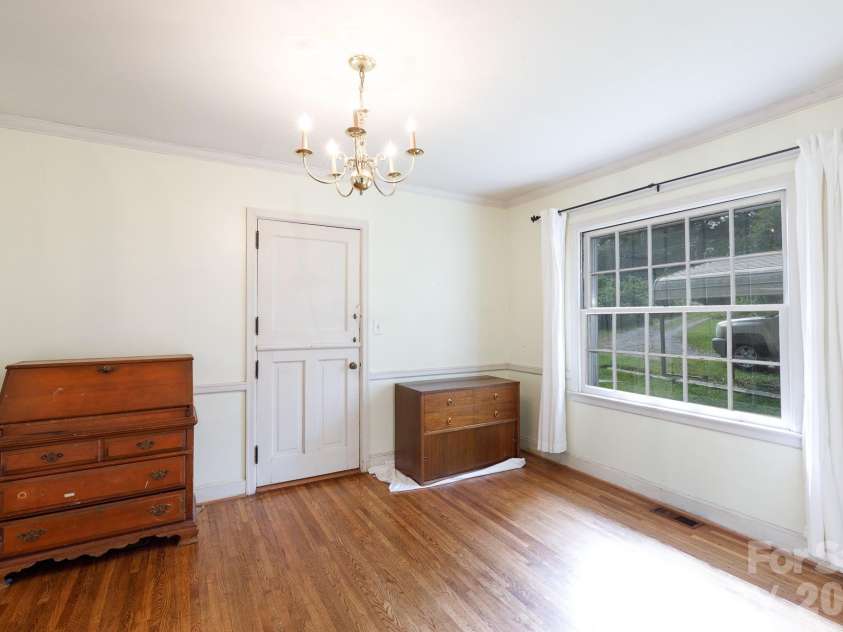 1017 Woodland Drive, Gastonia, NC 28054.  MLS# CAR4425603, YatesRealty ID 51213. Dining room overlooking back yard