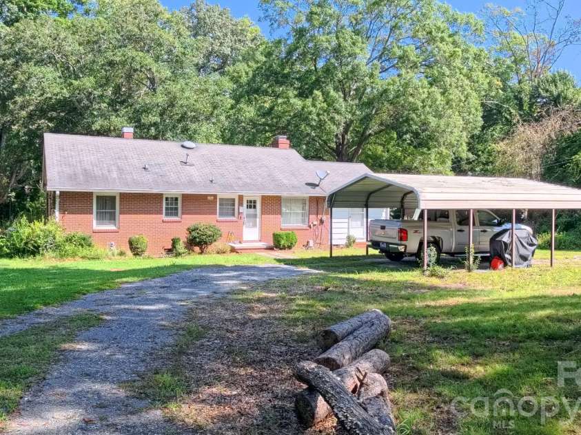 1017 Woodland Drive, Gastonia, NC 28054.  MLS# CAR4425603, YatesRealty ID 51213. Huge back yard