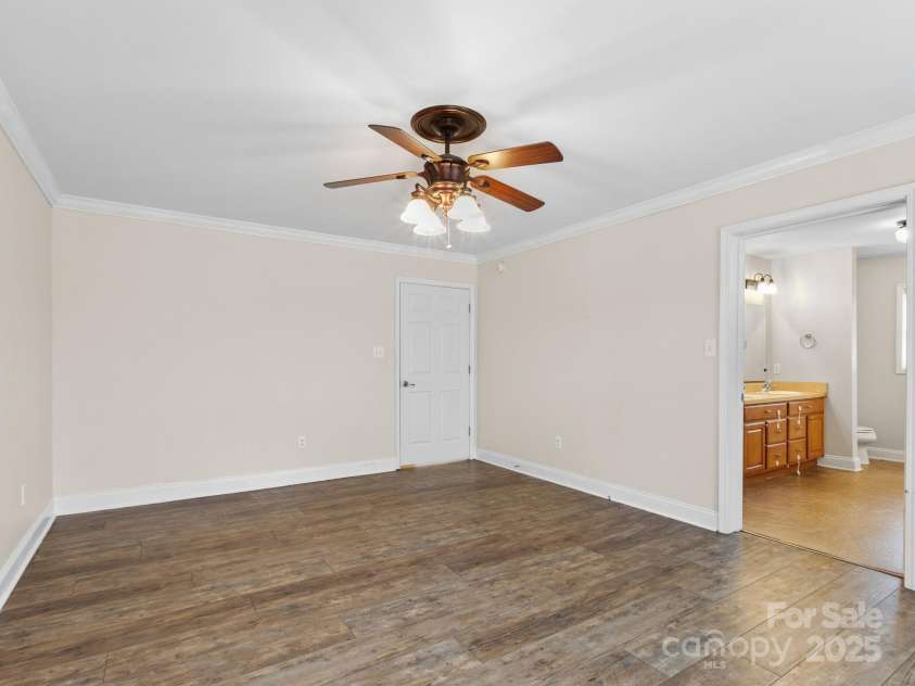 35 Donaldson Place, Waynesville, NC 28786.  MLS# CAR4239581, YatesRealty ID 5122. Primary bedroom and en suite.