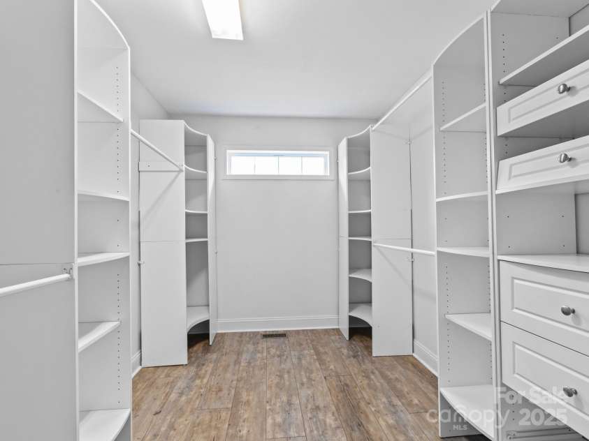 35 Donaldson Place, Waynesville, NC 28786.  MLS# CAR4239581, YatesRealty ID 5122. Primary walk-in closet.