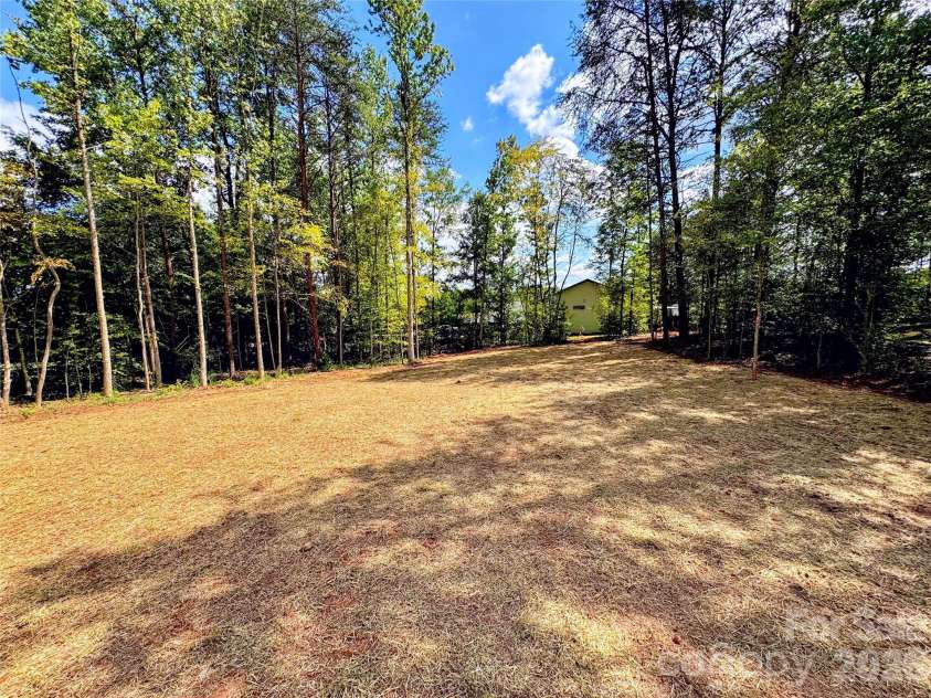 105 Cottontail Lane, Statesville, NC 28677.  MLS# CAR4424537, YatesRealty ID 51221. Backyard