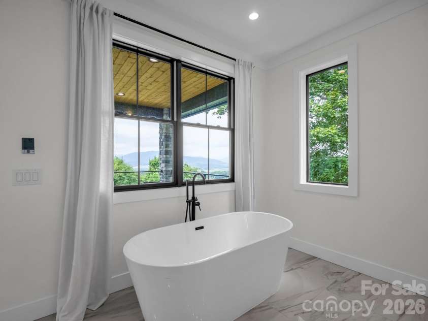 101 Balsamwood Road, Leicester, NC 28748.  MLS# CAR4425573, YatesRealty ID 51222. 