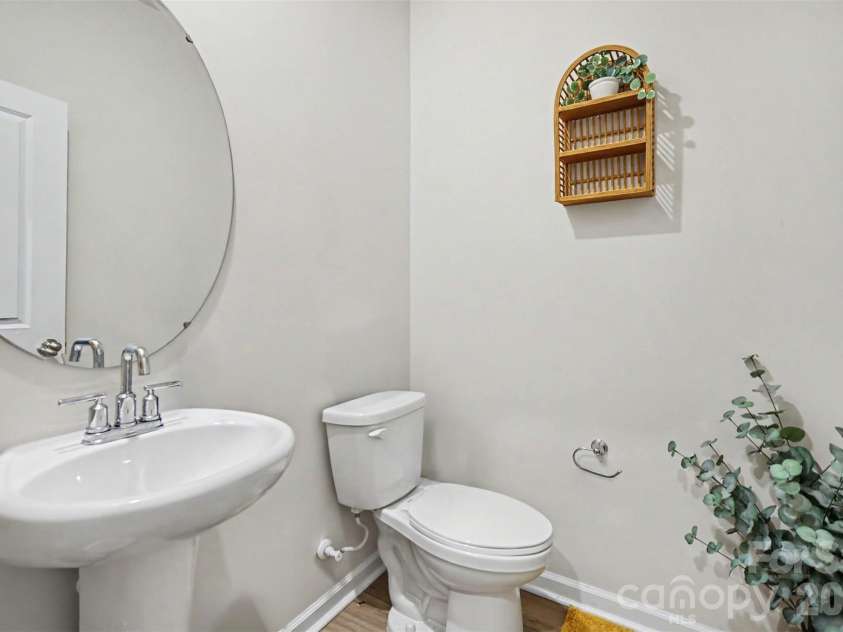 1623 Baymont Court, Stanley, NC 28164.  MLS# CAR4424072, YatesRealty ID 51244. A convenient powder room on the main level.