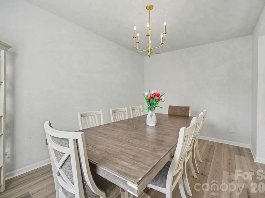 1623 Baymont Court, Stanley, NC 28164.  MLS# CAR4424072, YatesRealty ID 51244. A formal dining room ready for your next gathering.