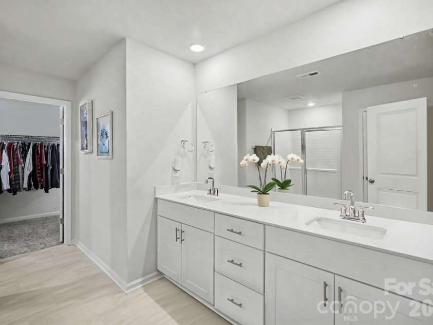 1623 Baymont Court, Stanley, NC 28164.  MLS# CAR4424072, YatesRealty ID 51244. Double vanity primary bath.