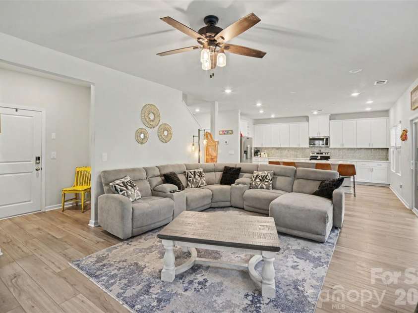 1623 Baymont Court, Stanley, NC 28164.  MLS# CAR4424072, YatesRealty ID 51244. The open great room flows right into the kitchen.