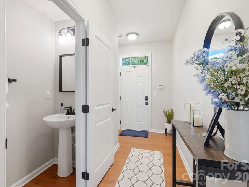 3224 Morgan Clark Road, Charlotte, NC 28208.  MLS# CAR4423182, YatesRealty ID 51257. Half Bath off foyer