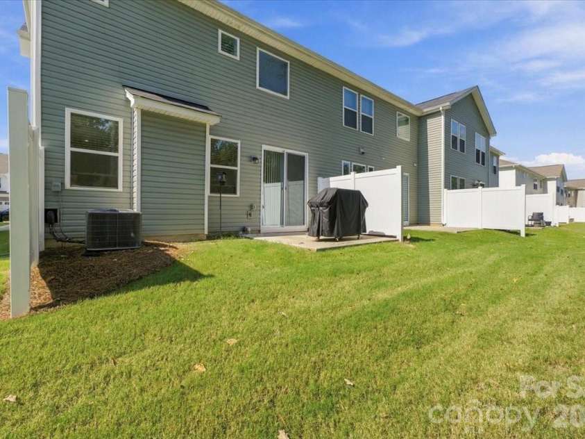 8036 Overmeadow Lane, Charlotte, NC 28269.  MLS# CAR4419889, YatesRealty ID 51259. Corner unit with backyard