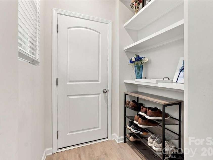 8036 Overmeadow Lane, Charlotte, NC 28269.  MLS# CAR4419889, YatesRealty ID 51259. Mudroom Drop zone off garage