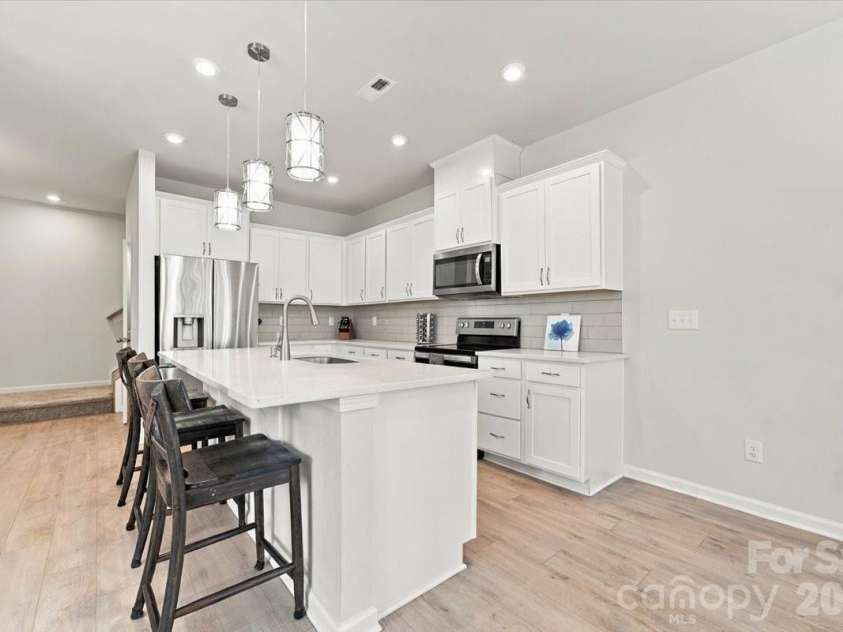 8036 Overmeadow Lane, Charlotte, NC 28269.  MLS# CAR4419889, YatesRealty ID 51259. Open kitchen