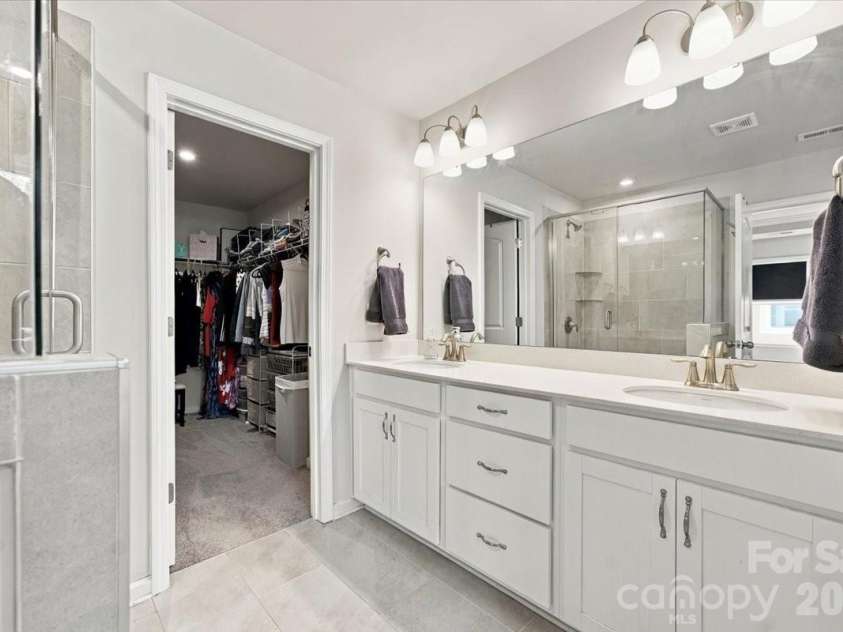 8036 Overmeadow Lane, Charlotte, NC 28269.  MLS# CAR4419889, YatesRealty ID 51259. Primary bathroom