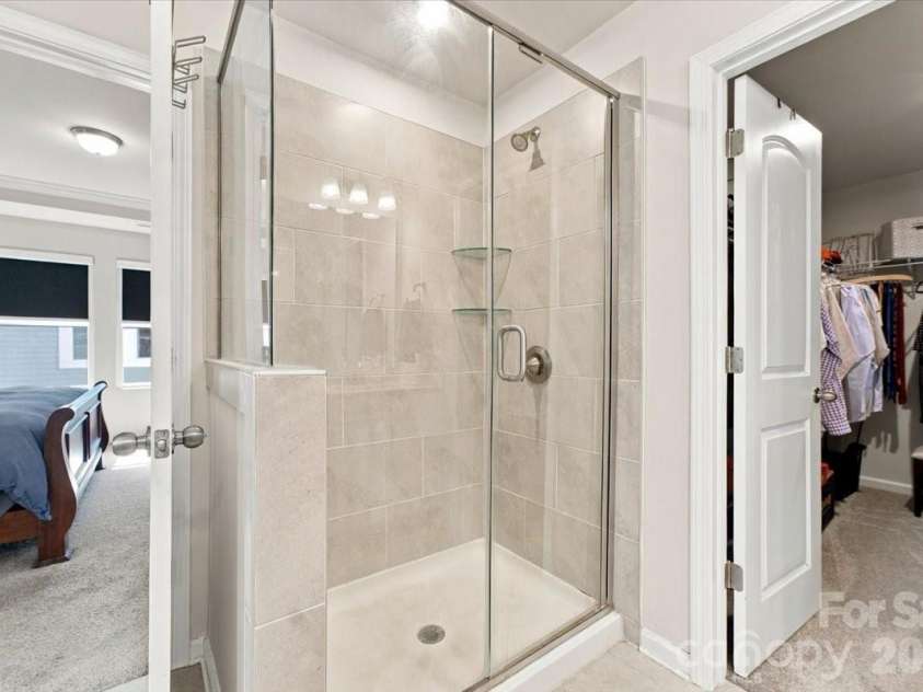 8036 Overmeadow Lane, Charlotte, NC 28269.  MLS# CAR4419889, YatesRealty ID 51259. Primary bathroom