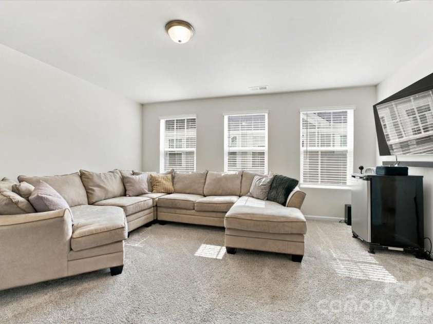 8036 Overmeadow Lane, Charlotte, NC 28269.  MLS# CAR4419889, YatesRealty ID 51259. Spacious second floor loft area
