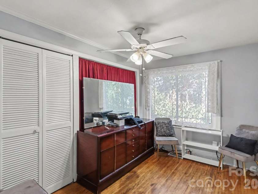 5528 Oak Drive, Charlotte, NC 28216.  MLS# CAR4419898, YatesRealty ID 51263. Downstairs Bedroom 1