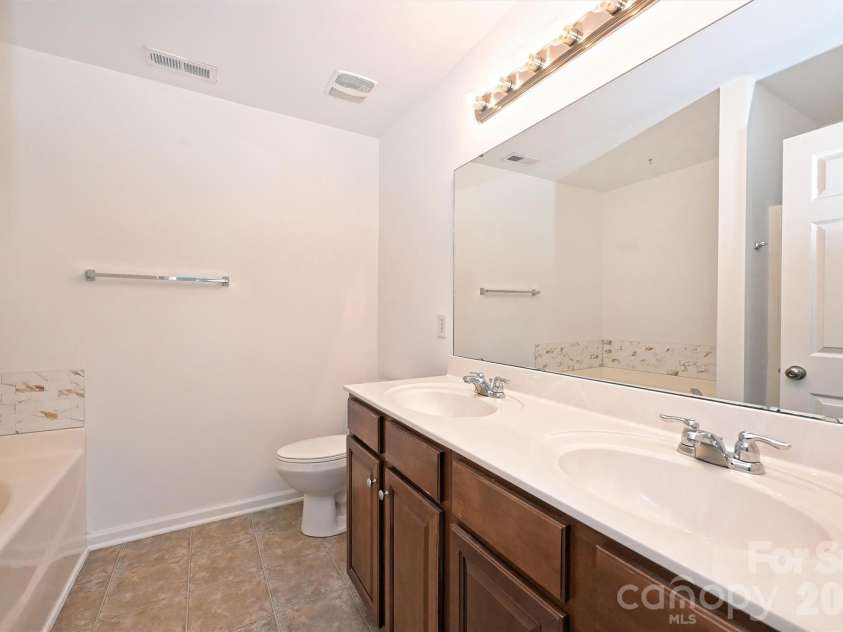 10612 Stoneacre Court, Pineville, NC 28134.  MLS# CAR4419839, YatesRealty ID 51264. Bath with dual sinks