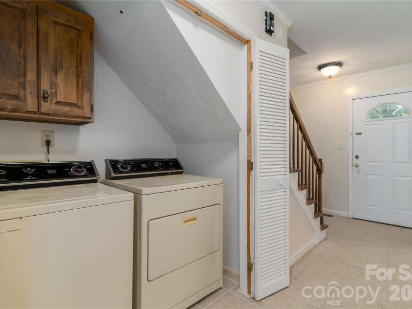 10717 Danesway Lane, Cornelius, NC 28031.  MLS# CAR4418933, YatesRealty ID 51266. Laundry on the main floor