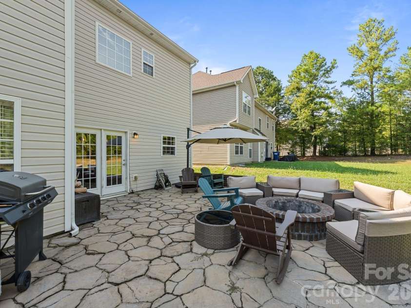 13439 Porter Creek Road, Charlotte, NC 28262.  MLS# CAR4418990, YatesRealty ID 51267. Back Patio