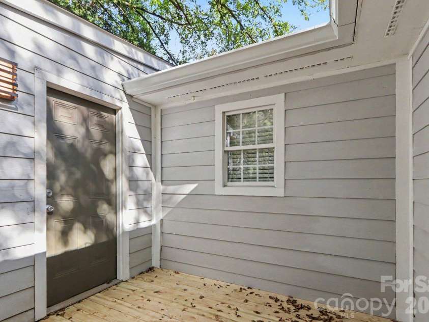 113 Smallwood Place, Charlotte, NC 28216.  MLS# CAR4413869, YatesRealty ID 51281. New back deck