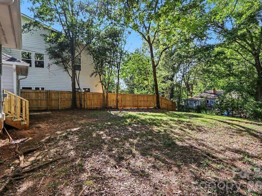 113 Smallwood Place, Charlotte, NC 28216.  MLS# CAR4413869, YatesRealty ID 51281. Spacious backyard