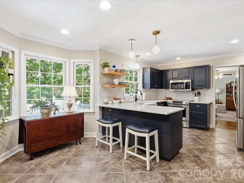 5138 Panhandle Circle, Matthews, NC 28104.  MLS# CAR4407389, YatesRealty ID 51282. Breakfast Room5138 Panhandle CirWeddington, NC 28104