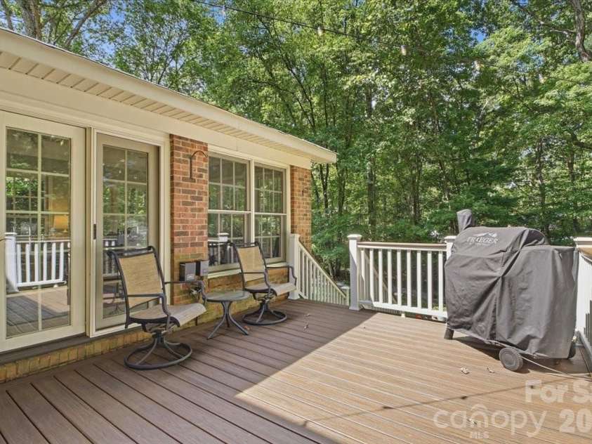 5138 Panhandle Circle, Matthews, NC 28104.  MLS# CAR4407389, YatesRealty ID 51282. Deck with Trex Planks5138 Panhandle CirWeddington, NC 28104