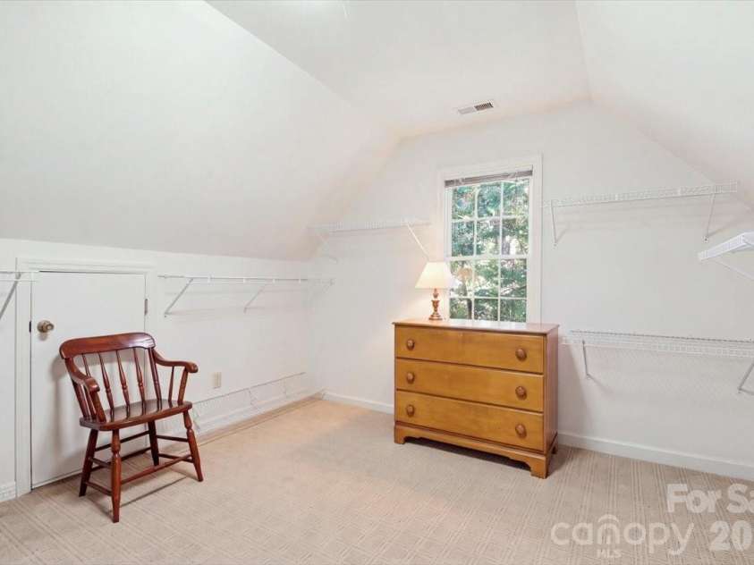 5138 Panhandle Circle, Matthews, NC 28104.  MLS# CAR4407389, YatesRealty ID 51282. Enormous Closet with Attic Access5138 Panhandle CirWeddington, NC 28104