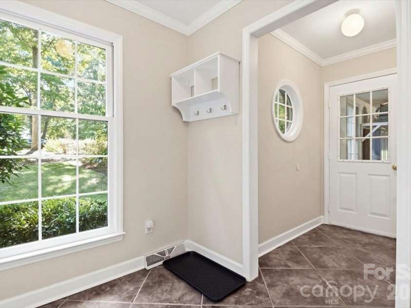 5138 Panhandle Circle, Matthews, NC 28104.  MLS# CAR4407389, YatesRealty ID 51282. Laundry and Drop Off Area - Three Closets5138 Panhandle CirWeddington, NC 28104