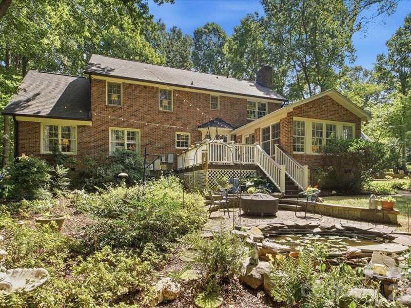 5138 Panhandle Circle, Matthews, NC 28104.  MLS# CAR4407389, YatesRealty ID 51282. Patio with Pond5138 Panhandle CirWeddington, NC 28104