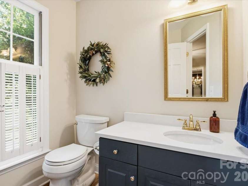 5138 Panhandle Circle, Matthews, NC 28104.  MLS# CAR4407389, YatesRealty ID 51282. Powder Room5138 Panhandle CirWeddington, NC 28104