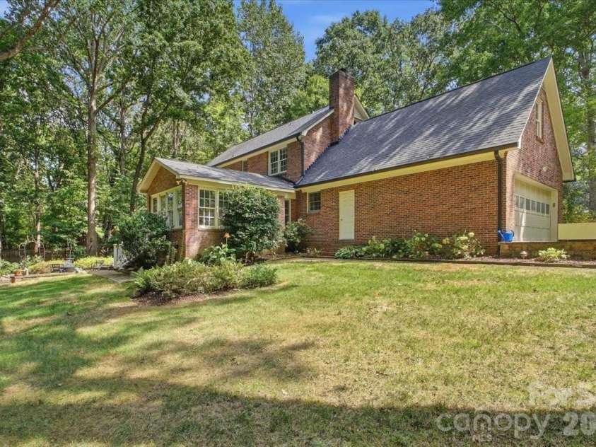 5138 Panhandle Circle, Matthews, NC 28104.  MLS# CAR4407389, YatesRealty ID 51282. Rear Exterior5138 Panhandle CirWeddington, NC 28104