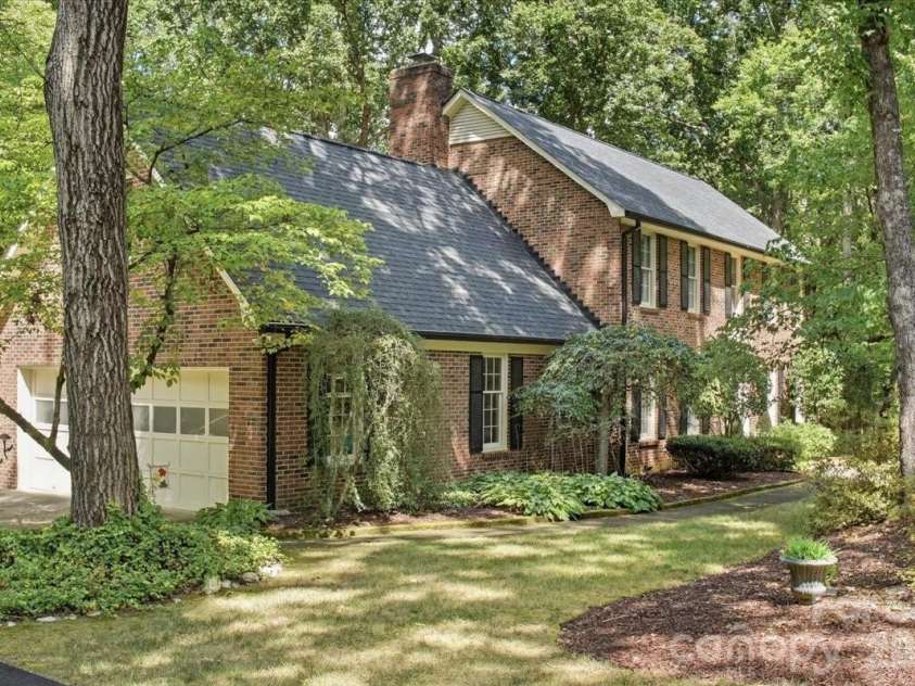 5138 Panhandle Circle, Matthews, NC 28104.  MLS# CAR4407389, YatesRealty ID 51282. Side Exterior5138 Panhandle CirWeddington, NC 28104